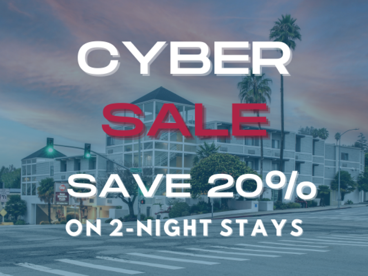 The image features a promotional ad for a "Cyber Sale" offering 20% off on 2-night stays, with a background of a building and street.